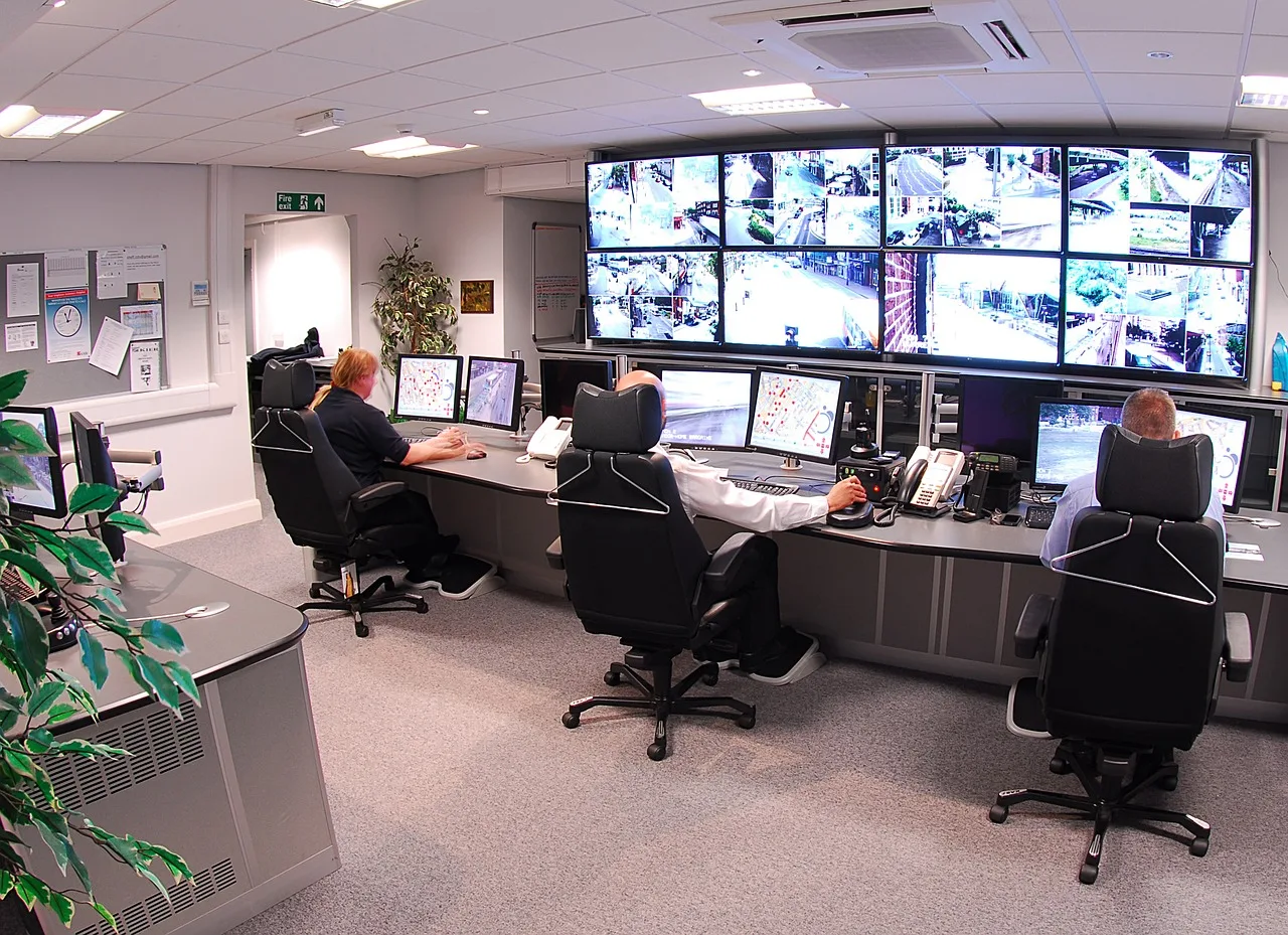 Security monitoring screens in a control room