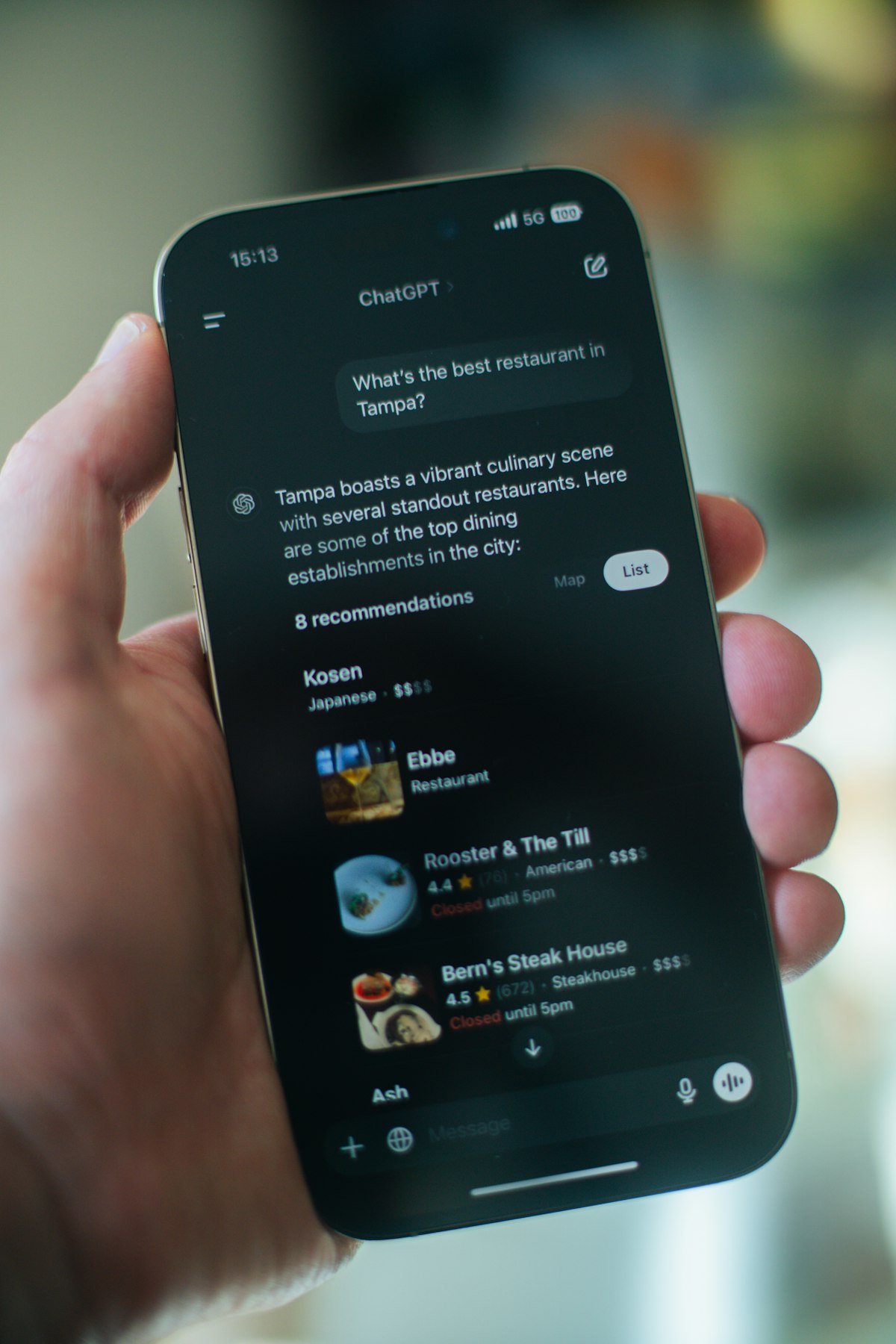 Person using the ChatGPT app on an iPhone to get recommendations